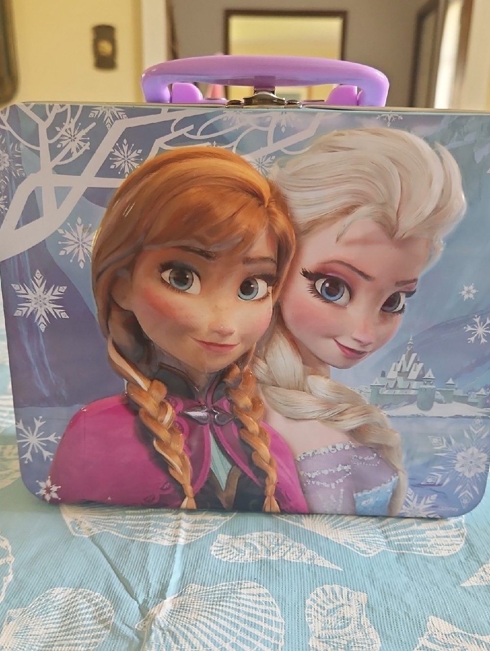 Frozen Tin Lunchbox In Good condition. Has A Small dent.